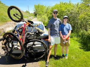 Two bikes and tires from the bottom of the turtle pond